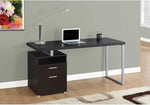 A black finish Mango Wood Calio Study Desk Table with a drawer and side cabinet, set against a wall with a painting above the desk. A laptop and a desk lamp are on the desk, and there is a chair pulled up to the desk.