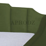 Close-up of green Krease Daybed’s tufted velvet backrest, showcasing detailed stitching and cushioned comfort.