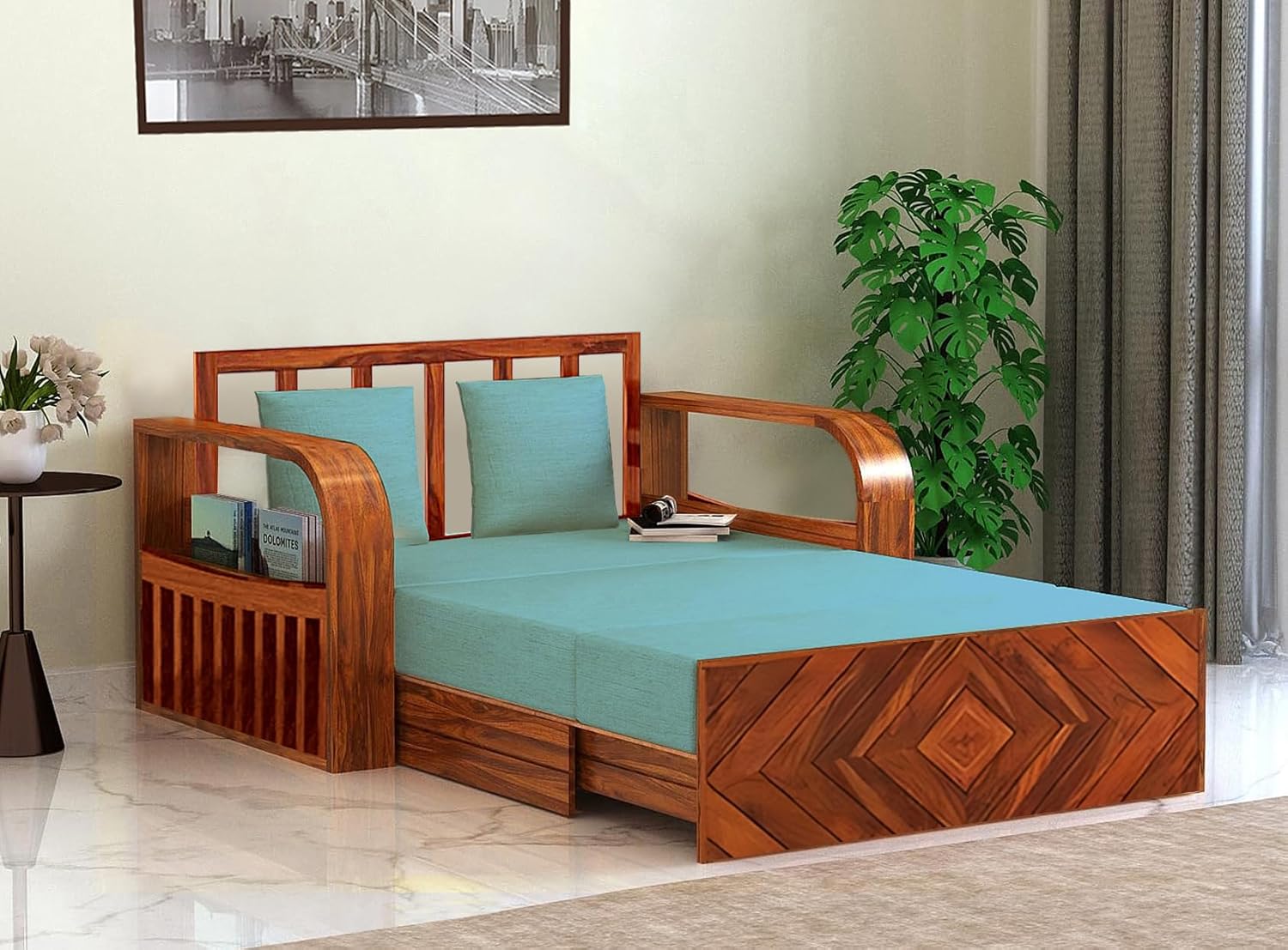 Sheesham wood 2-seater sofa cum bed with teal upholstery and built-in storage.