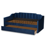 Navy blue Krease Daybed with trundle drawer open, ideal for maximizing sleeping space in small rooms.
