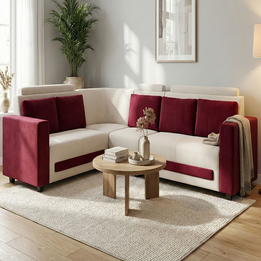 Modern L-shaped sofa with cream and burgundy cushions in a bright living room with wooden coffee table
