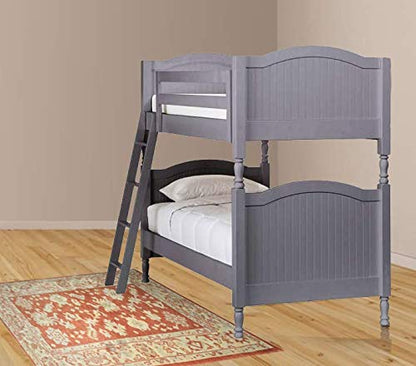 A gray wooden bunk bed with the lower bed made up, a ladder against the bed, placed on a red patterned rug.